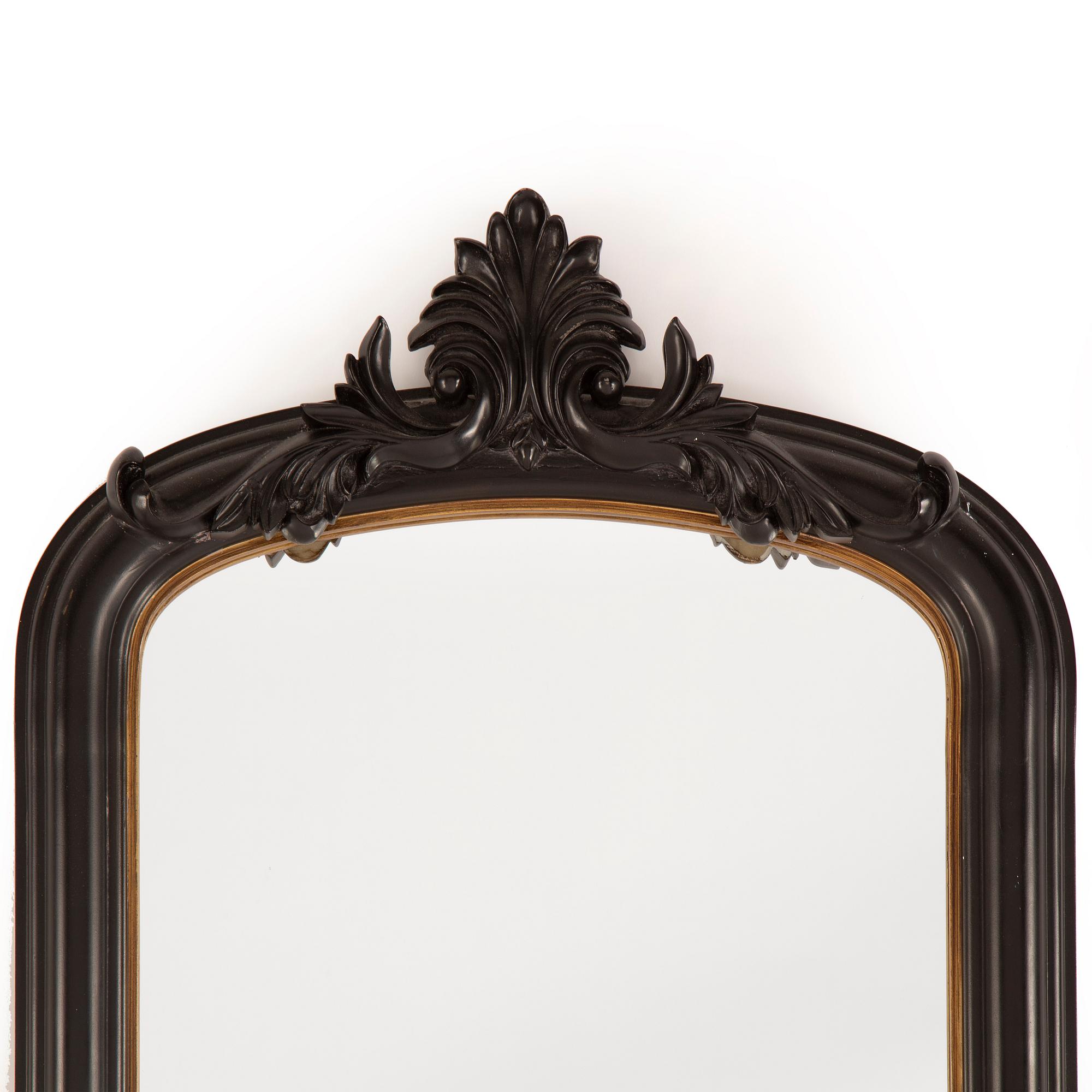 A contemporary floor mirror.