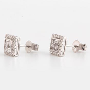 Brilliant-cut and baguette cut diamond earrings.