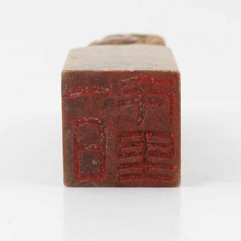 A set of four stone scholars objects and a enameled silver box with cover, Qing dynasty, circa 1900.