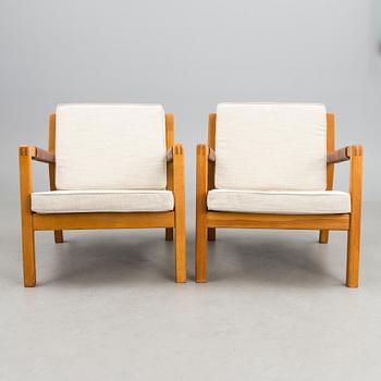 A pair of Mid-Century Rialto Armchairs, manufacturer Puunveisto Oy - Träsnideri Ab, Finland.