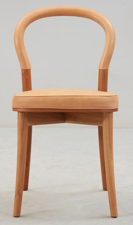 An Erik Gunnar Asplund walnut and beige leather 'Göteborg' chair, by Cassina, Italy.