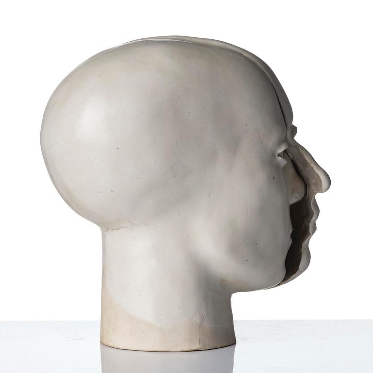 Britt-Ingrid "BIP" Persson, a glazed stoneware sculpture of faces, ca. 1970.