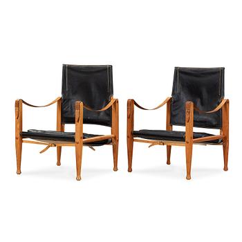 Kaare Klint, A pair of oak and black leather 'Safari Chairs', Rud Rasmussens Snedkerier, Denmark.