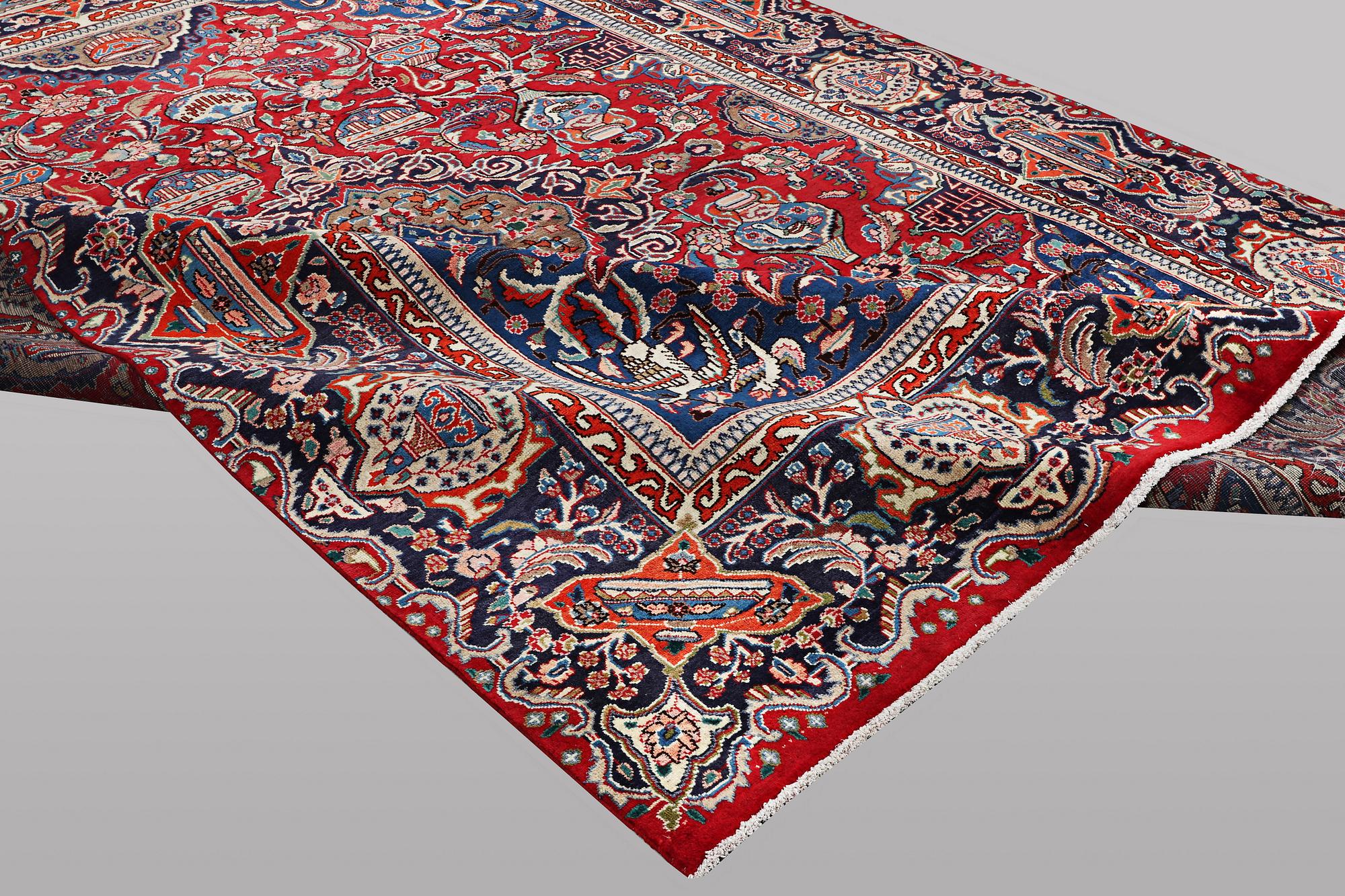 A carpet, Kashan, ca 388 x 290 cm.
