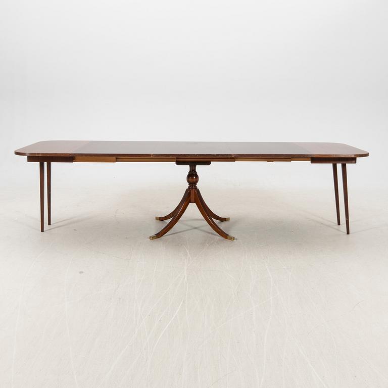 A mid 1900s English style mahogany dining table.