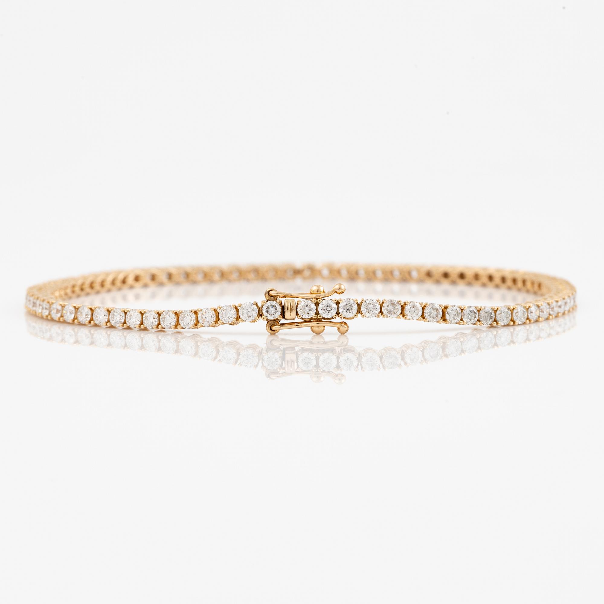 Tennisarmband 18K guld med briljantslipade diamanter.