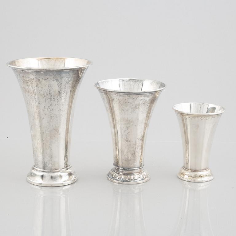 A set of three Swedish silver beakers, including CG Hallberg, Stockholm 1951.