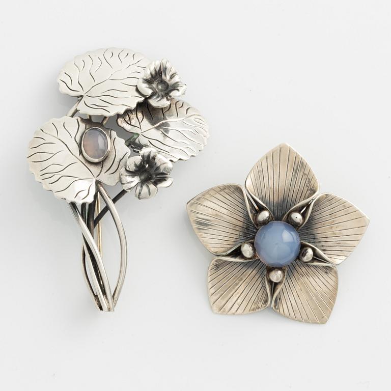 Arvo Saarela, two silver brooches.