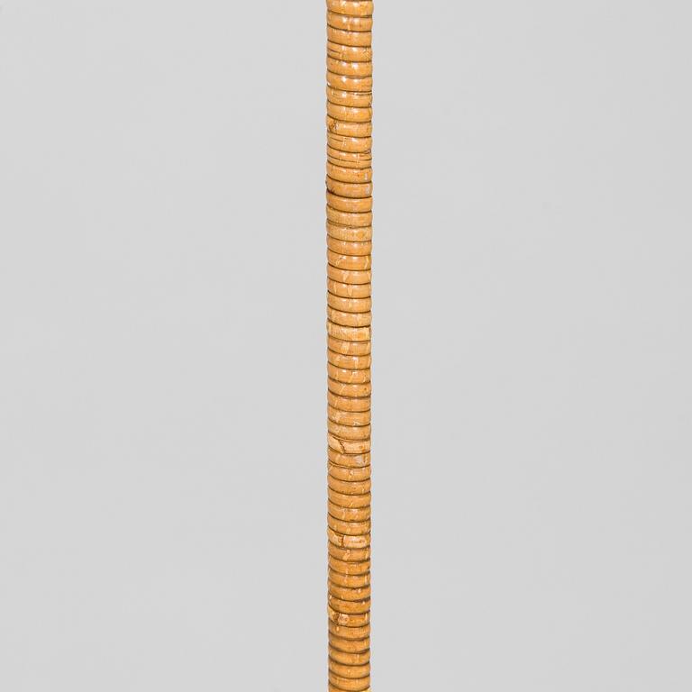 Paavo Tynell, a mid-20th century K10-10 floor lamp for Taito.