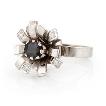 503. Claës E. Giertta, a ring 18K white gold with sapphire and brilliant-cut diamonds, Stockholm 1977.