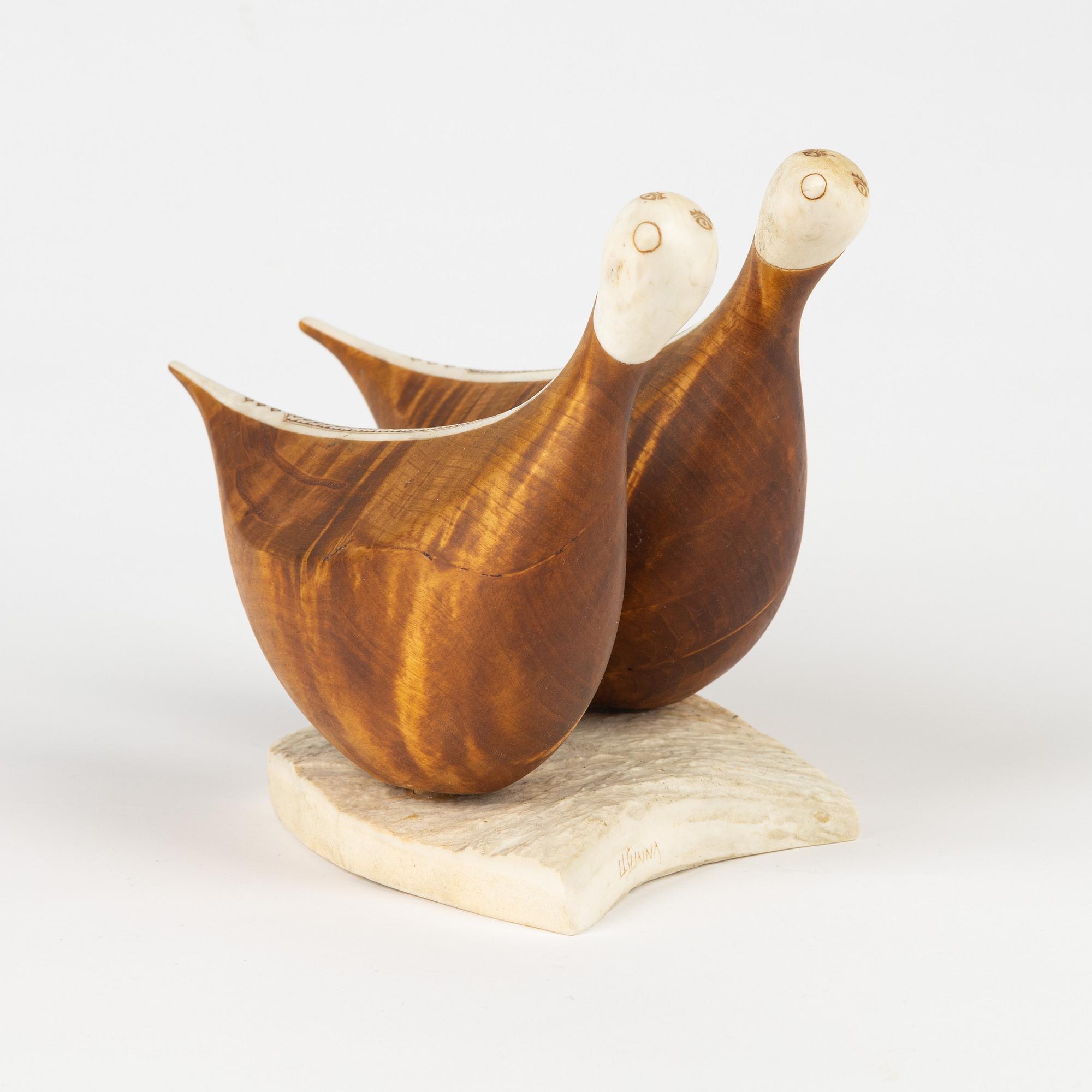 Lars Levi Sunna, sculpture, birch and renideer horn, signed LL Sunna.