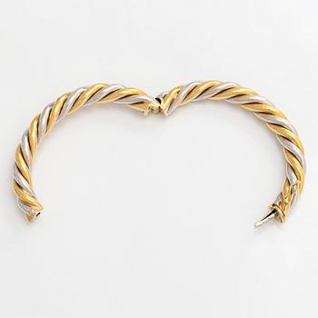 An 18K gold/white gold bracelet, Switzerland.
