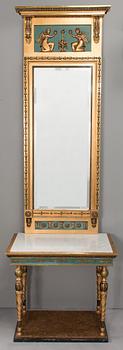 An early 20th century mirror with console table in late Gustavian style.