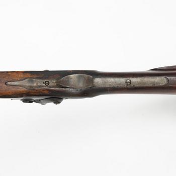 Percussion gun.