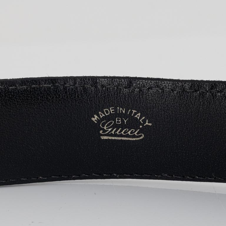 Gucci, two black leather belts, size 70-85.
