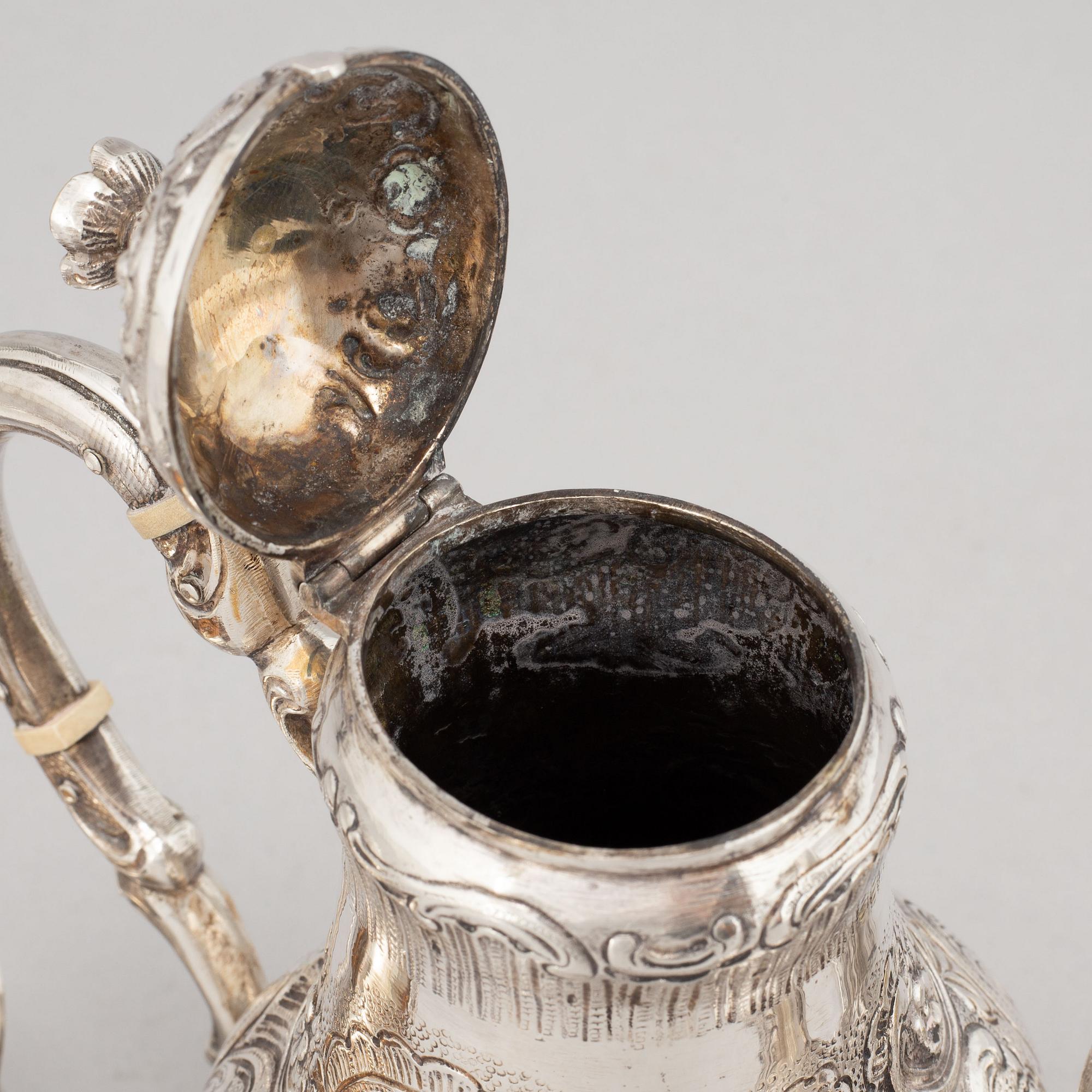 A silver mocha pot, creamer, sugar bowl and tray, some with mark of Gewe, Malmö 1950-51.