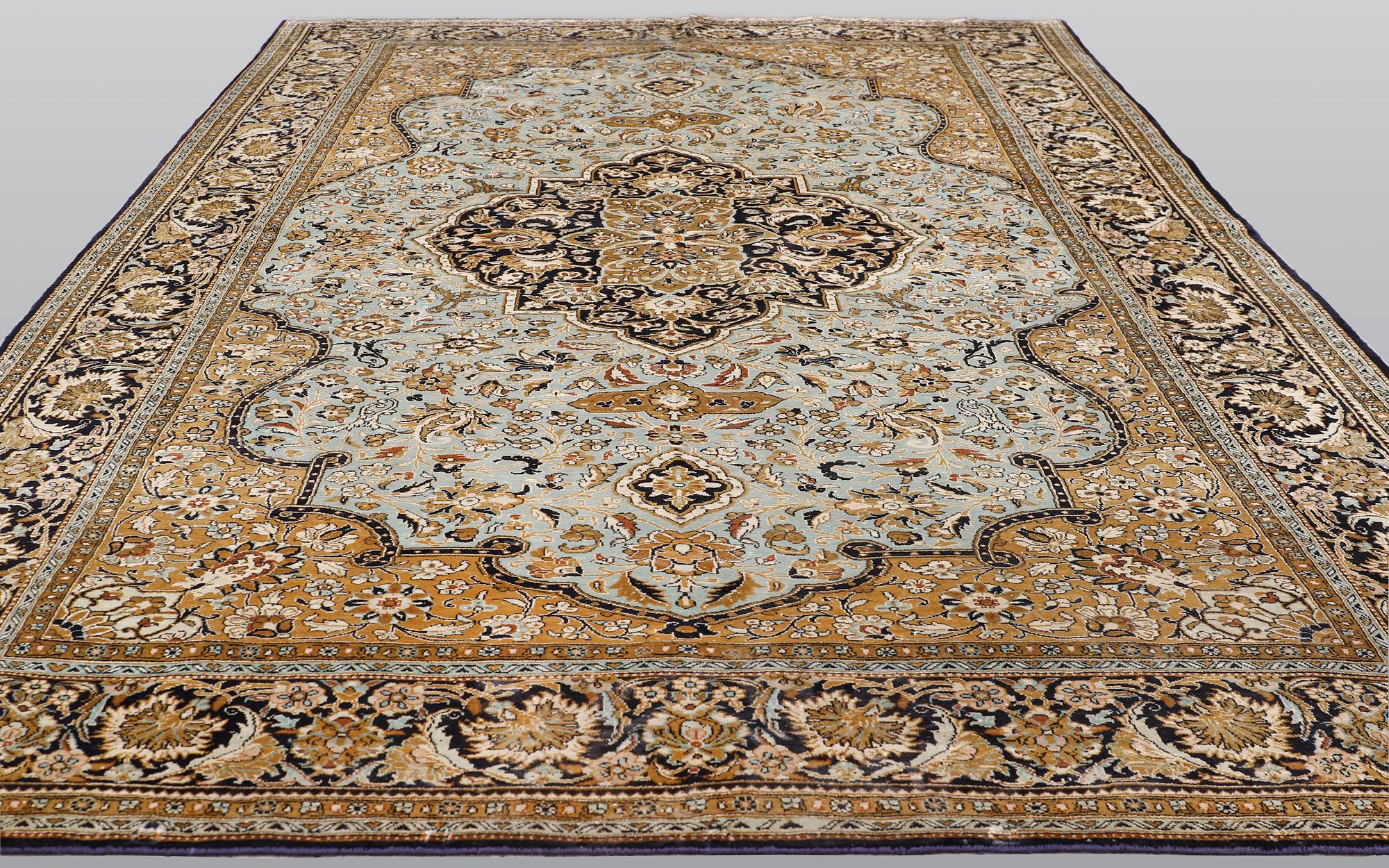 A carpet, silk Qum, ca 203 x 134 cm.