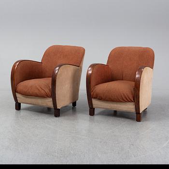 A pair of 1930's easy chairs.