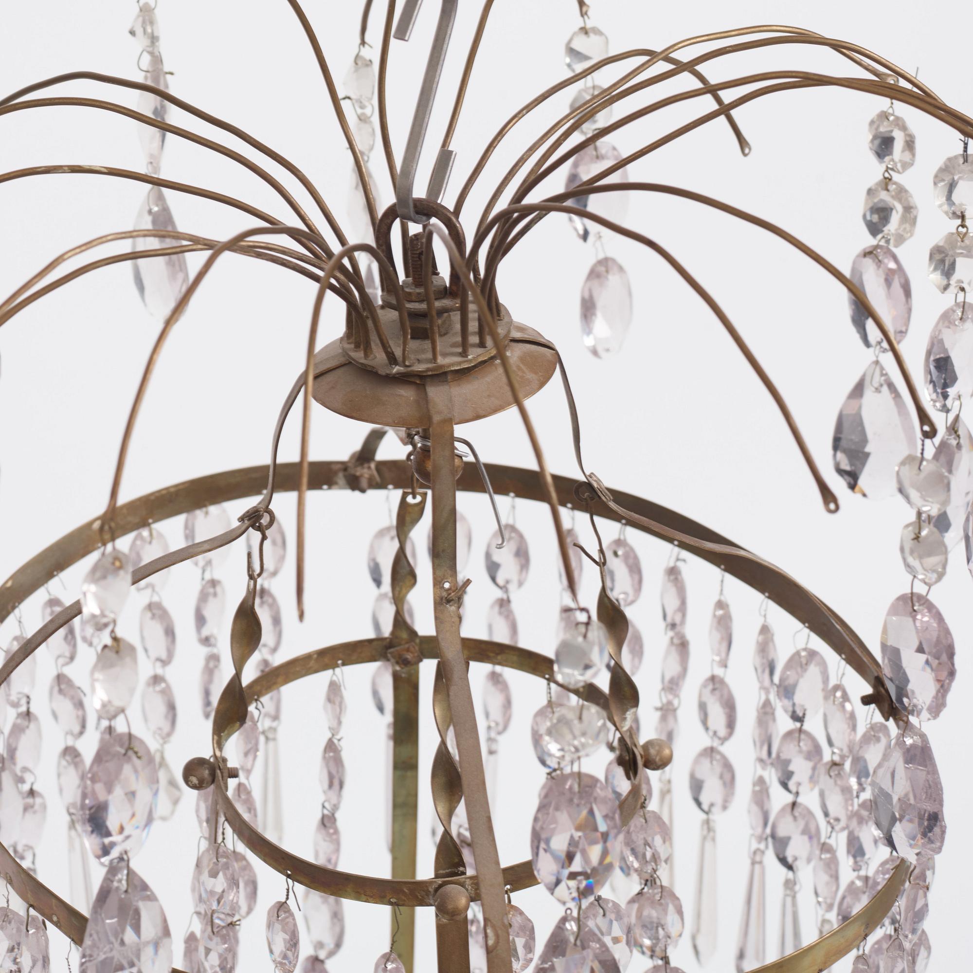 A Late Gustavian gilt brass and cut glass eight-light chandelier, circa 1800.