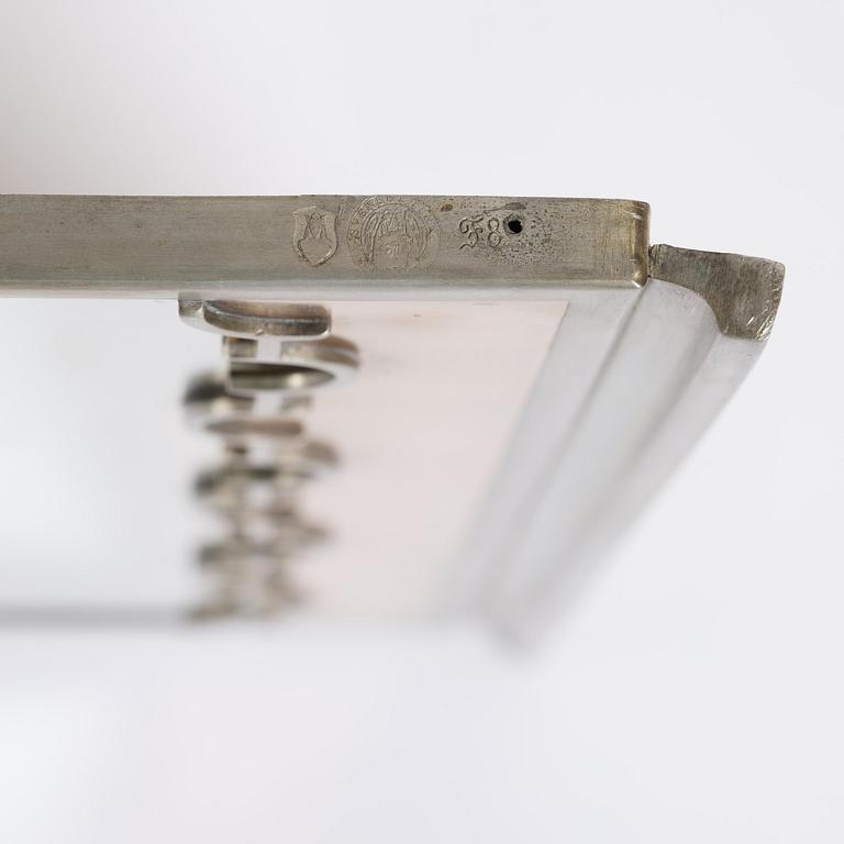 Nils Fougstedt, a rare pewter and brass wall mirror model A 679, Firma Svenskt Tenn, Stockholm, 1932.