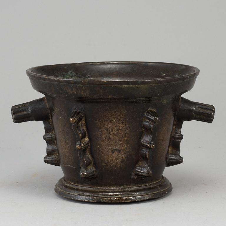 A 16th century bronze mortar.