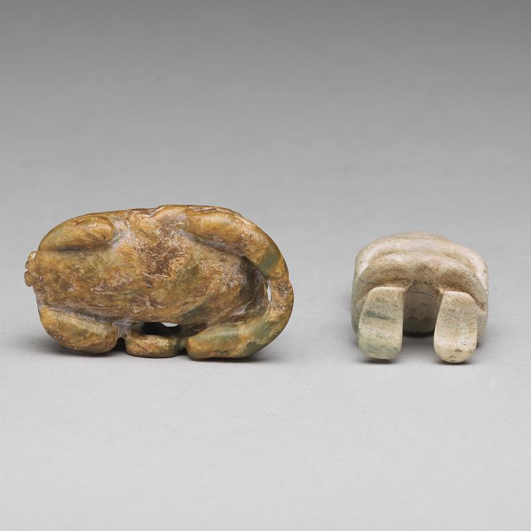 Two archaistic stone sculptures.