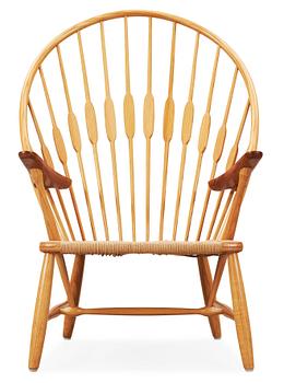 A Hans J Wegner ash and teak 'Peacock chair', Johannes Hansen, Denmark.