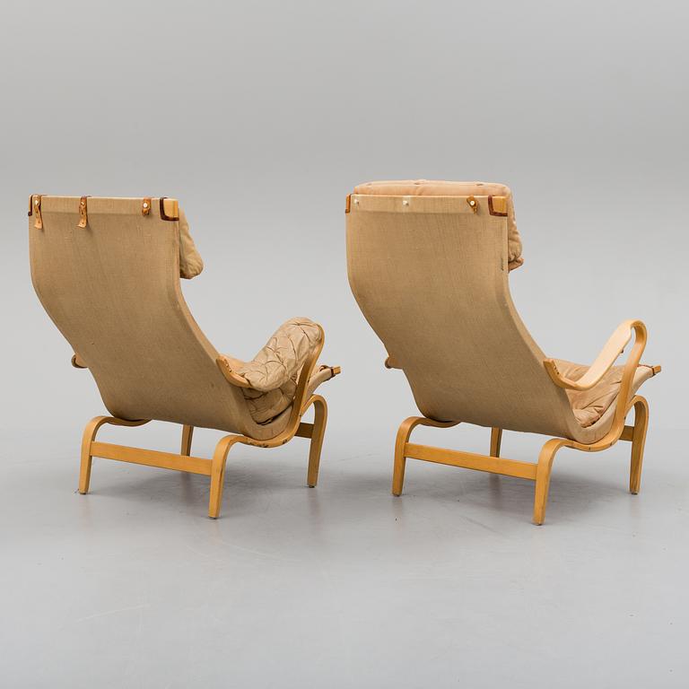 a pair of 'Pernilla' easy chairs by Bruno Mathsson, second half of the 20th century.