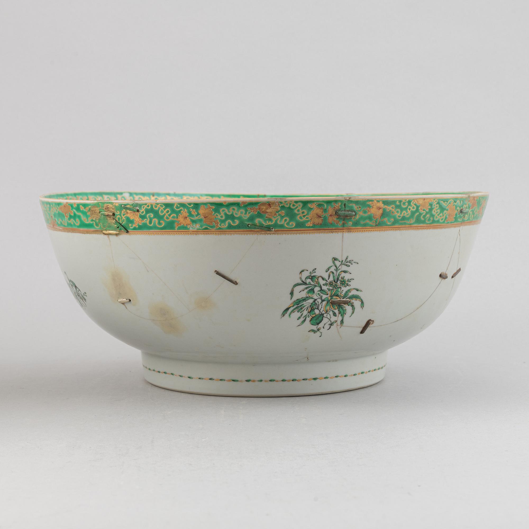 Two large famille rose and gilt punch bowls, Qing dynasty, 18th century.