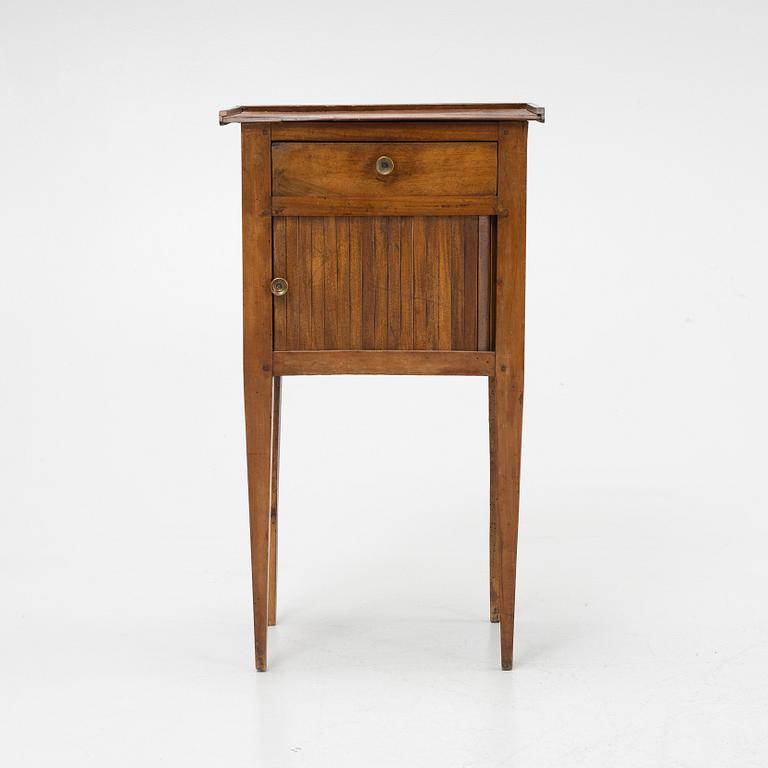 An early 19th Century nightstand.