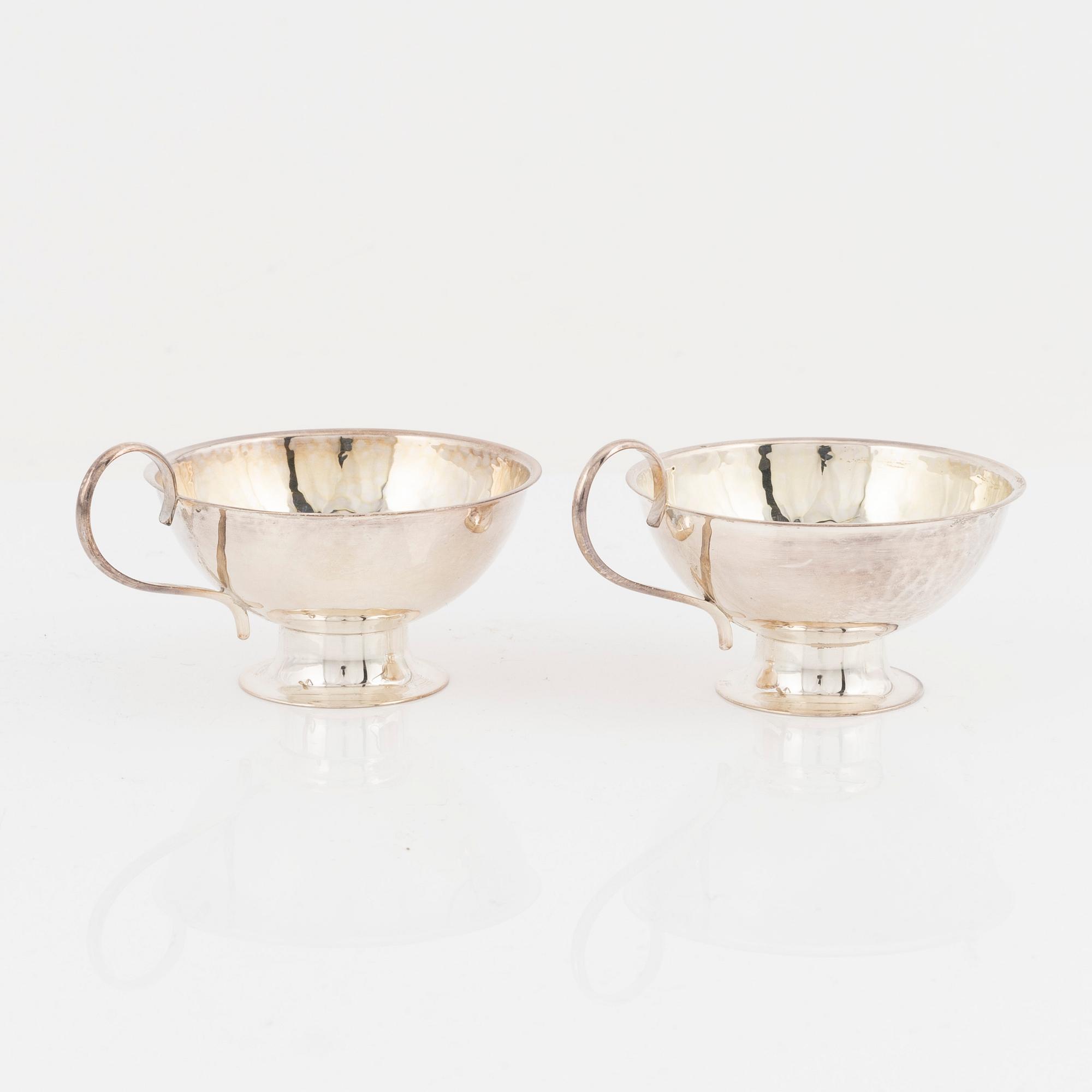 Twelve Swedish silver punsch mugs, including Gufa Gundefeldt & Falk, Gothenburg 1959.
