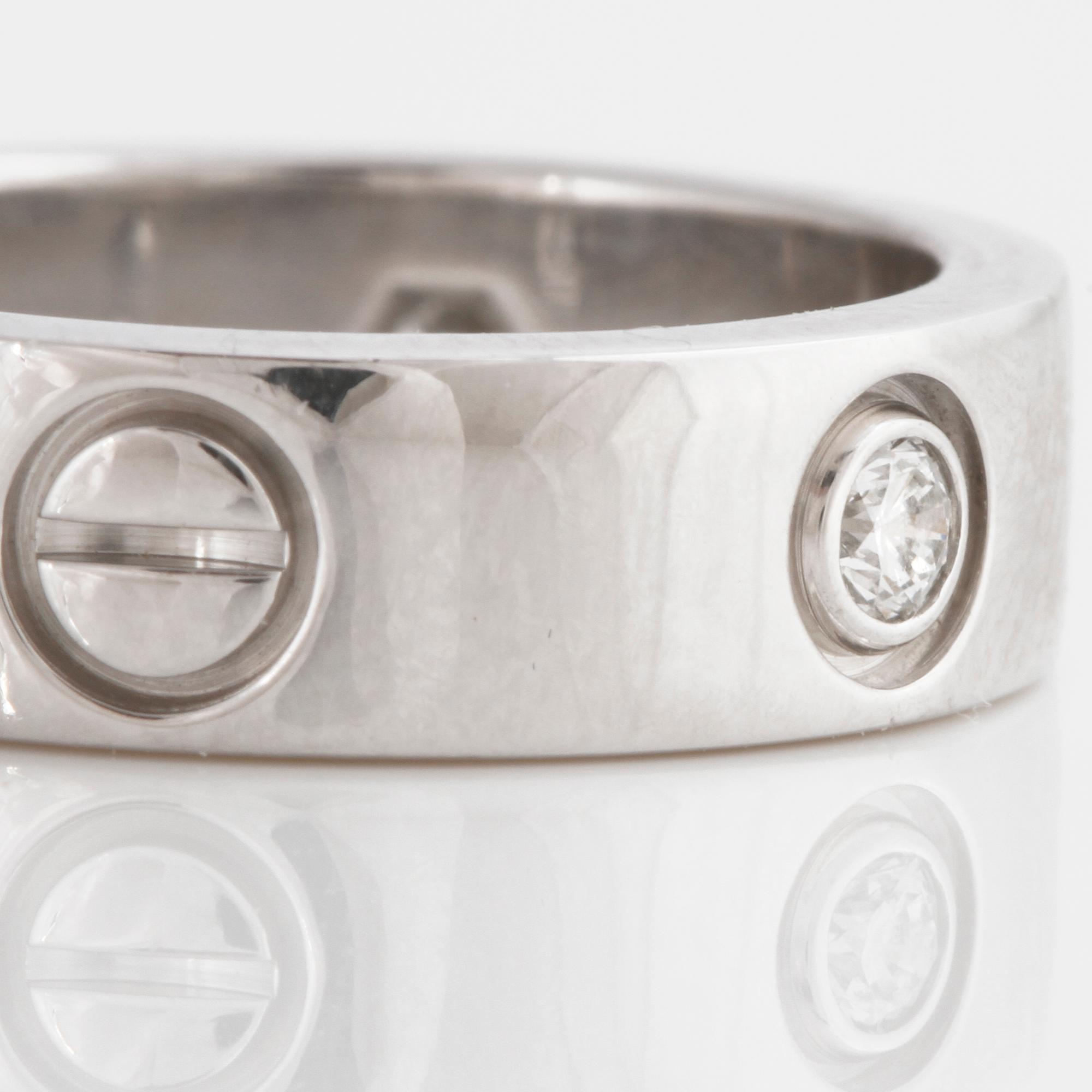 A brilliant-cut diamond "Love" Cartier ring.