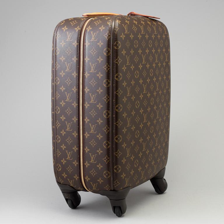 A Monogram Canvas "Zephyr" Suitcase by Louis Vuitton.