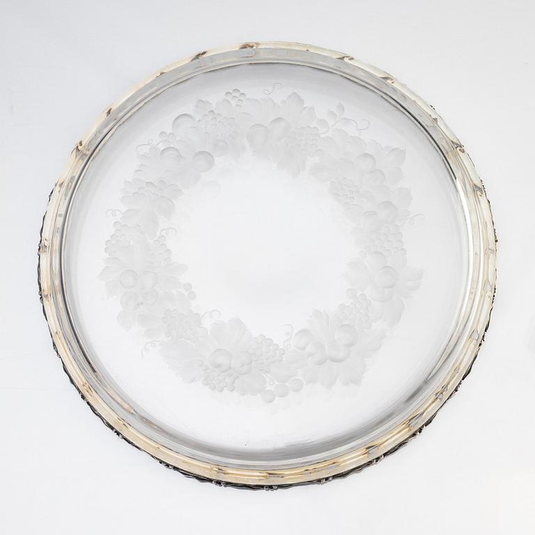 An unusually large cut glass dish with silver mounted rim, W.A. Bolin, Stockholm 1919.