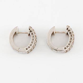 Earrings, a pair, 18K white gold set with baguette and brilliant-cut diamonds.