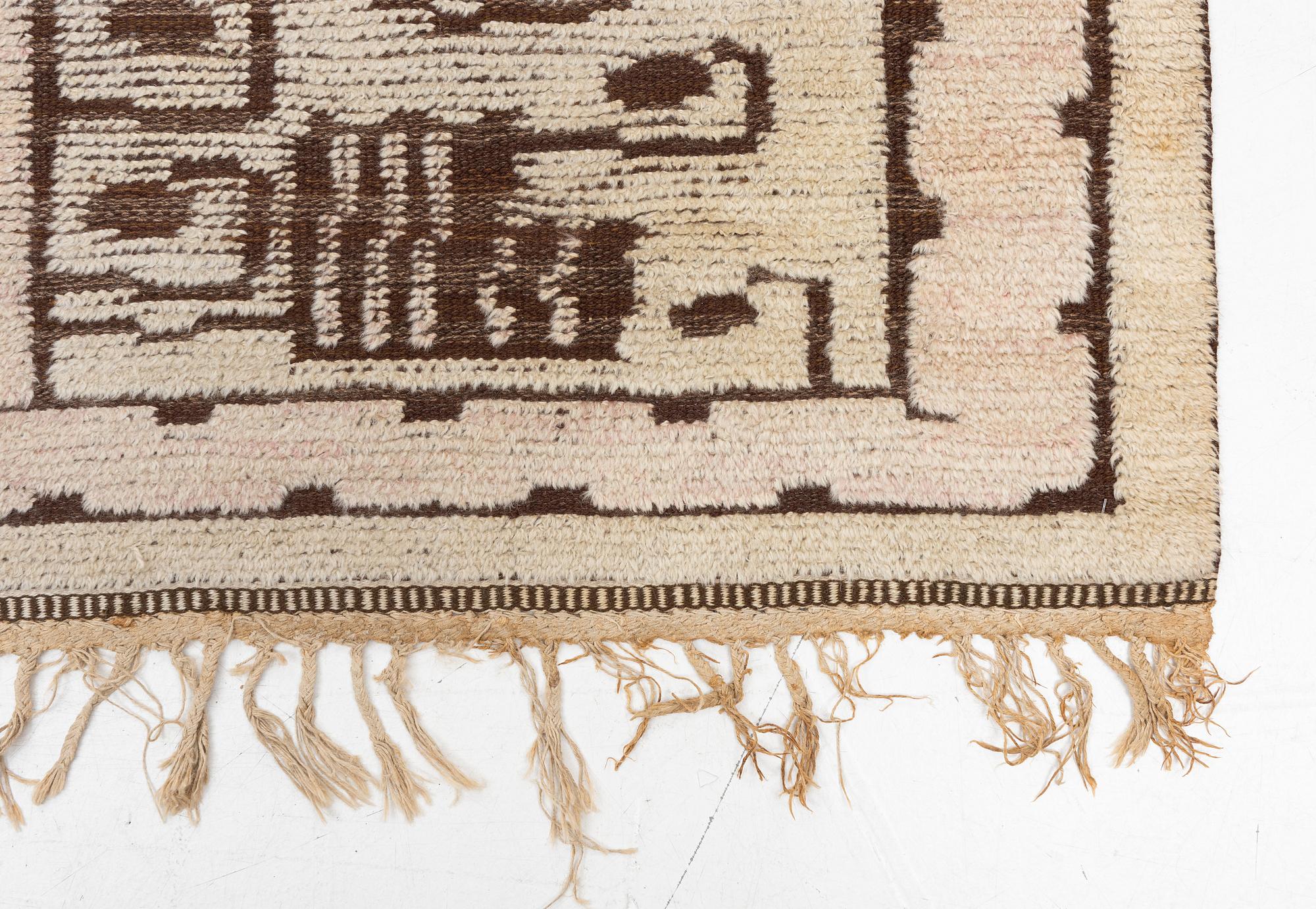 Märta Måås-Fjetterström, A 'Skvattram' carpet, knotted pile in relief, ca 365 x 228 cm, signed AB MMF.