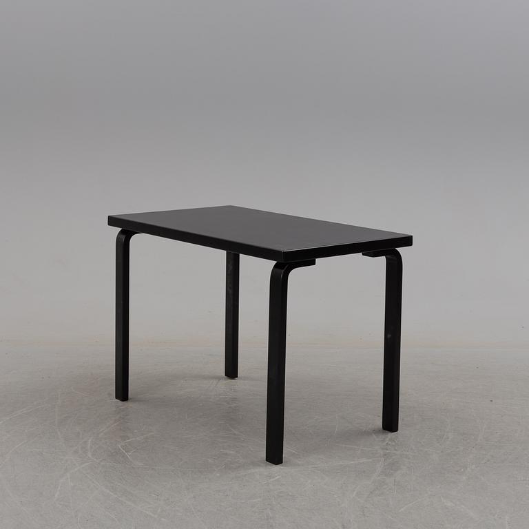 a dining table '81B' and four '69' chairs by Alvar Aalto, Artek.