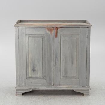 A Gustavian cupboard, circa 1800.