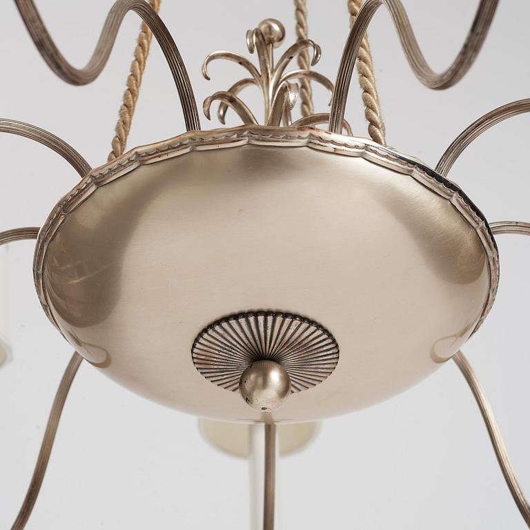 Swedish Grace, a silver plated ceiling lamp for nine lights, 1920's.