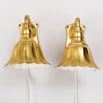 A pair of brass wall lights, second half of the 20th Century.