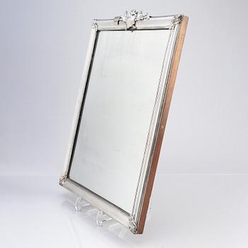 A Swedish Rococo mid-18th century mirror with silver frame  signed by Christian Precht.