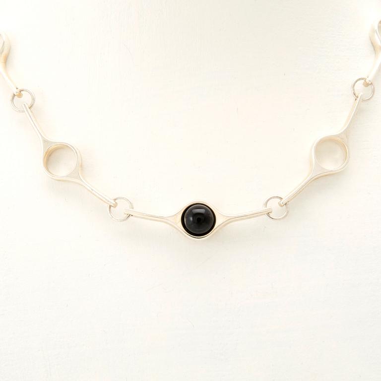 Georg Jensen, "Sphere" necklace in silver with cabochon-cut onyx.