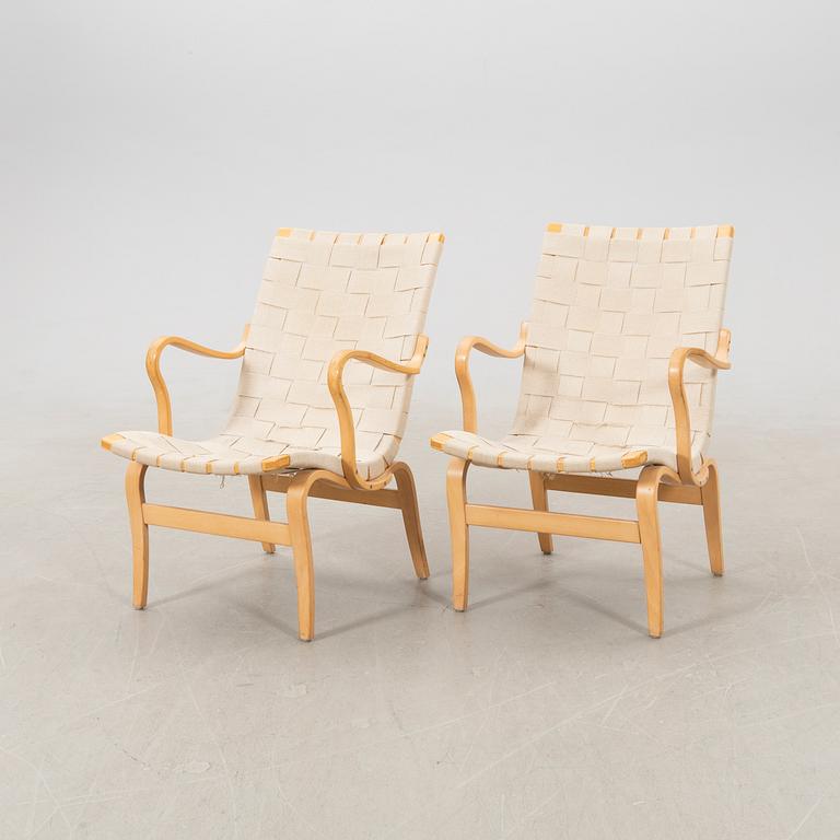 Bruno Mathsson, a pair of "Eva" armchairs for DUX, late 20th century.