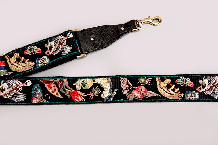 A Valentino strap.