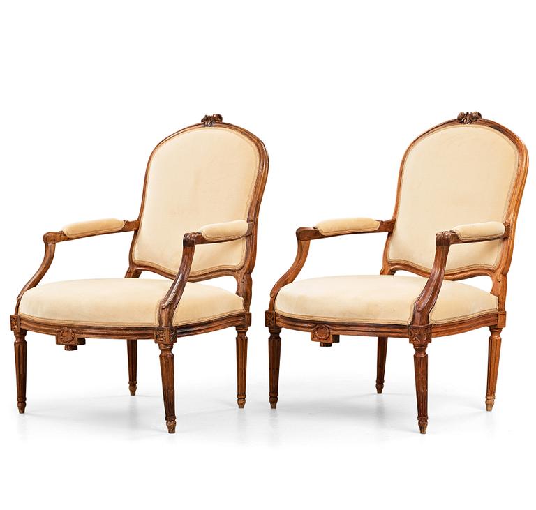 A pair of Louis XVI late 18th century armchairs.