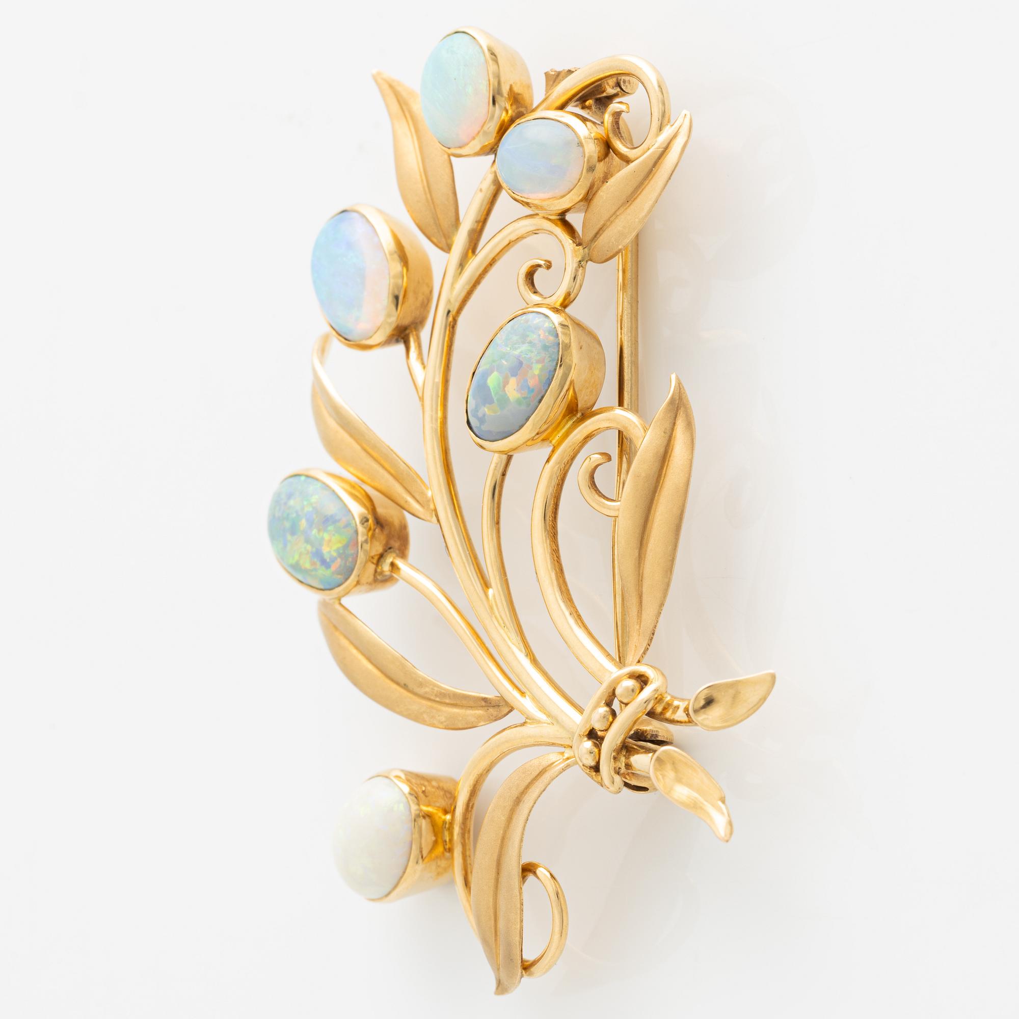 Brooch 18K gold with opals.