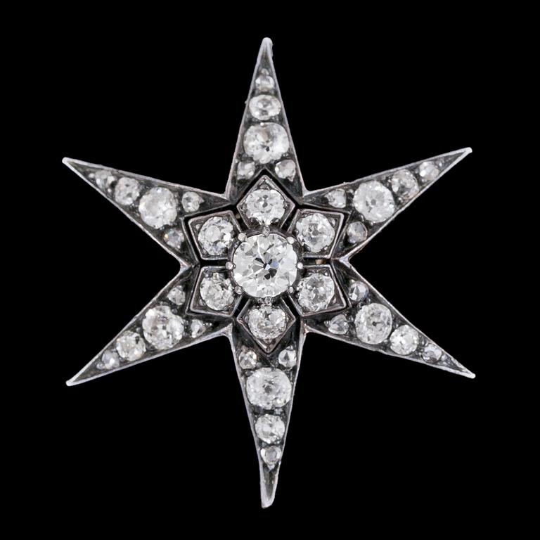 BROSCH/HÄNGE, gammalslipade diamanter, tot. ca 2 ct, i form av stjärna, sent 1800-tal.