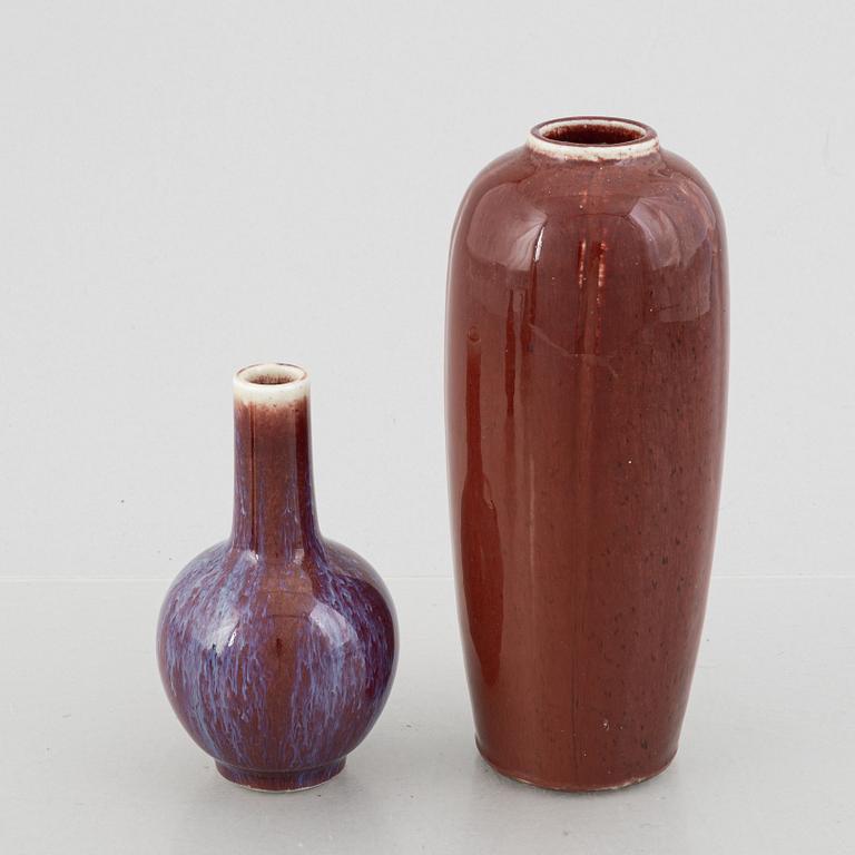 Four oxblood glazed porcelain vases, China, 20th century.