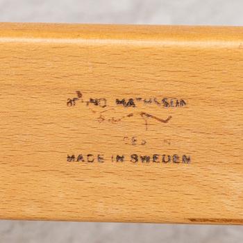 An 'Eva' easy chair by Bruno Mathsson for Firma Karl Mathsson dated 1971.