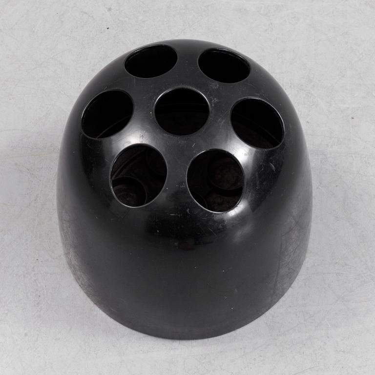 EMMA GISMONDI SCHWEINBERGER, a 'Dedalo' plastic umbrella stand from Artemide, Milan, Italy.